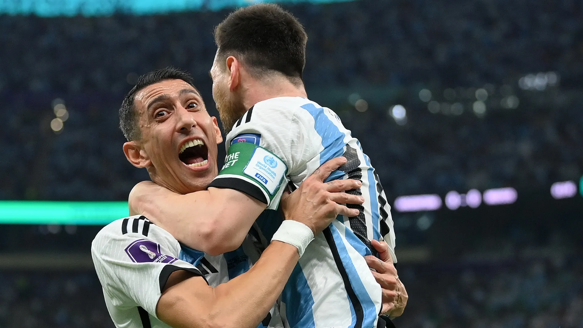 Angel Di Maria and Lionel Messi celebrate Argentina’s goal against Mexico during the 2022 FIFA World Cup.