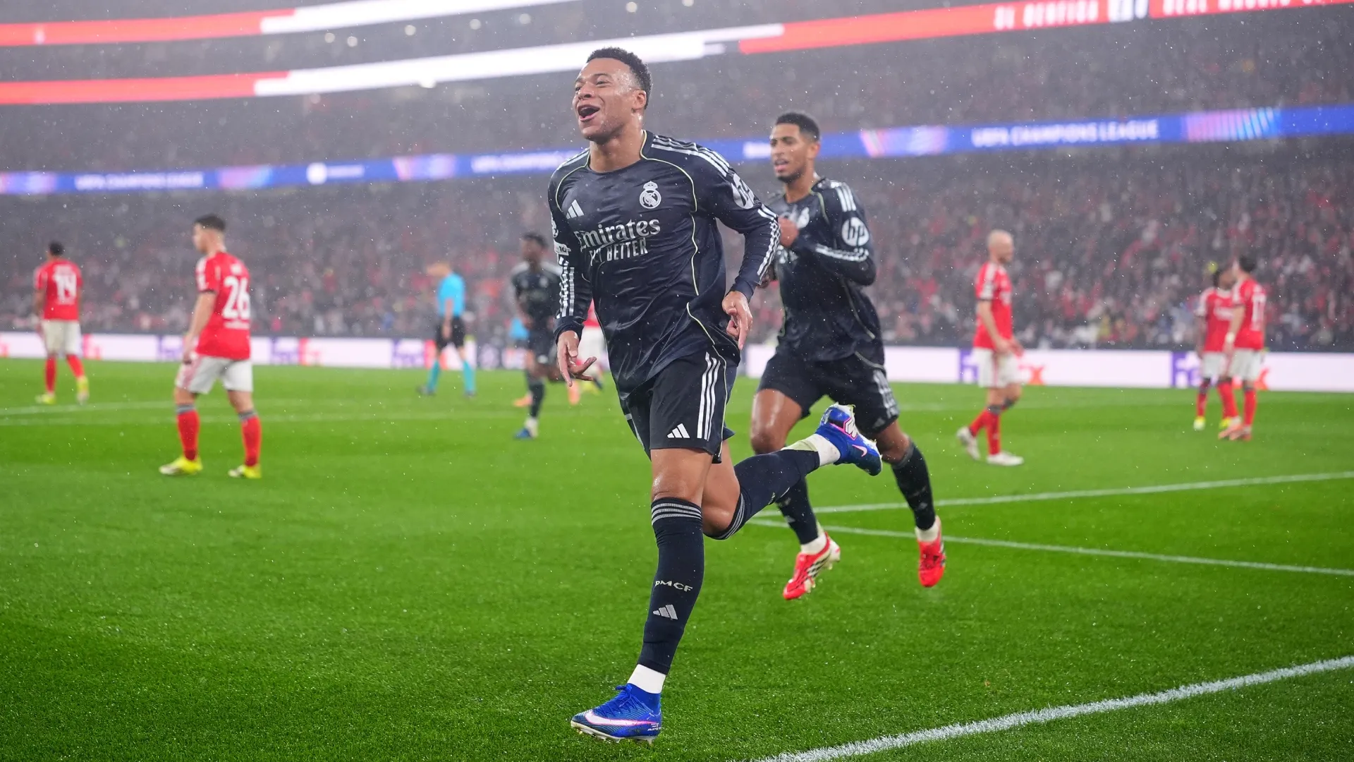 Kylian Mbappe of Real Madrid celebrates scoring against Benfica.