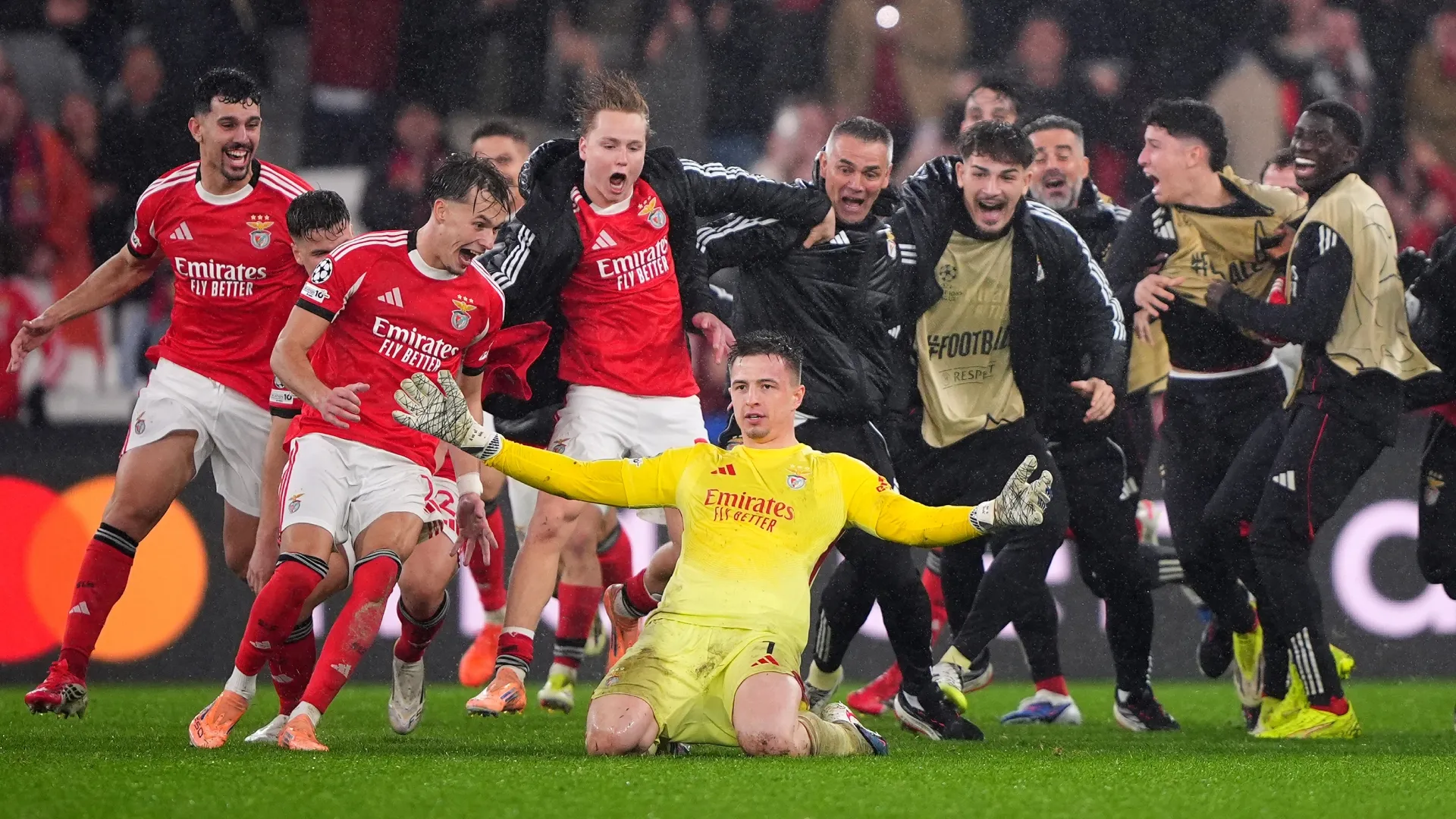 Anatoliy Trubin of Benfica celebrates scoring against Real Madrid.