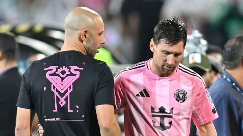 Lionel Messi of Inter Miami talks with Javier Mascherano as he leaves the field.