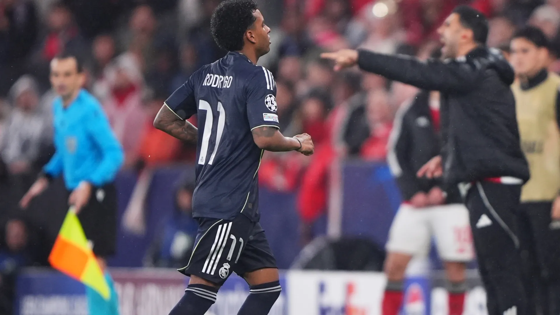 Rodrygo leaving the field in the defeat to Benfica (Jose Manuel Alvarez Rey/Getty Images)