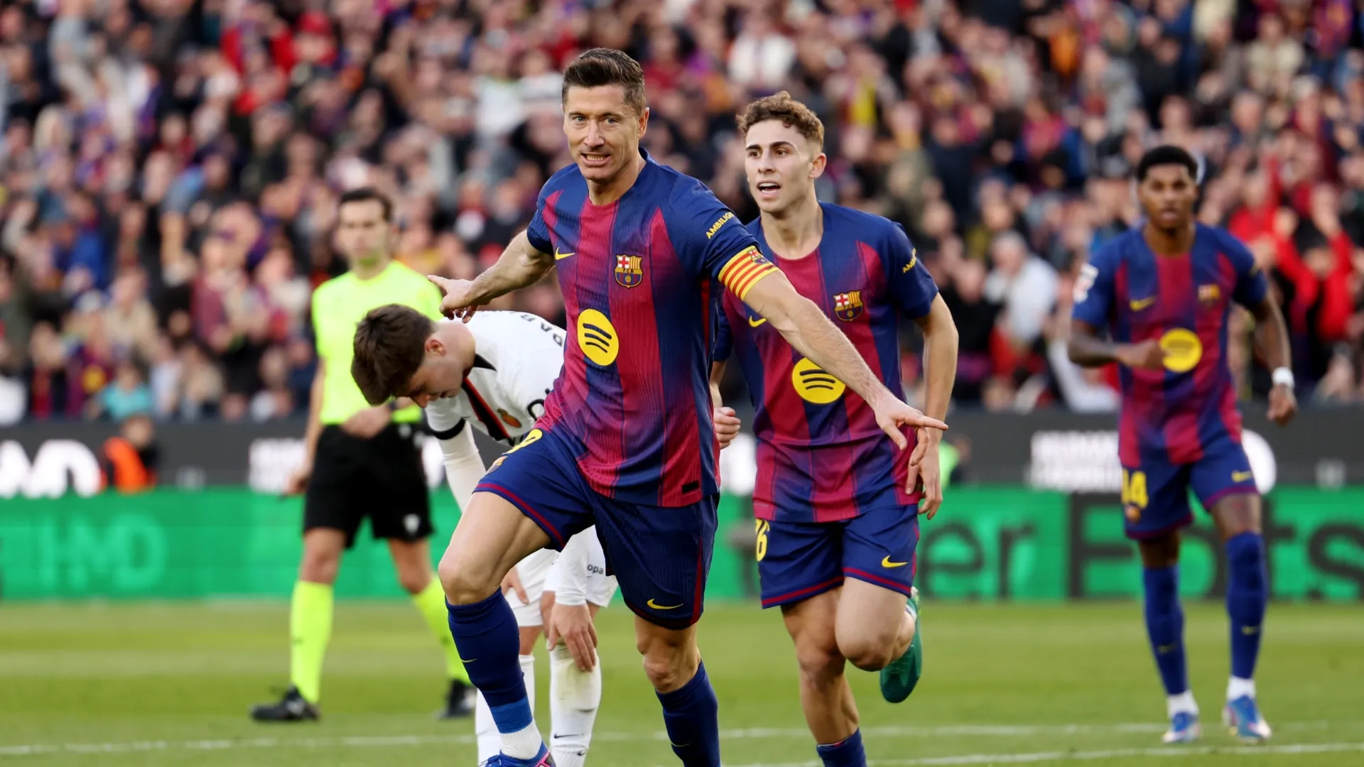 Robert Lewandowski of FC Barcelona celebrates scoring against RCD Mallorca.