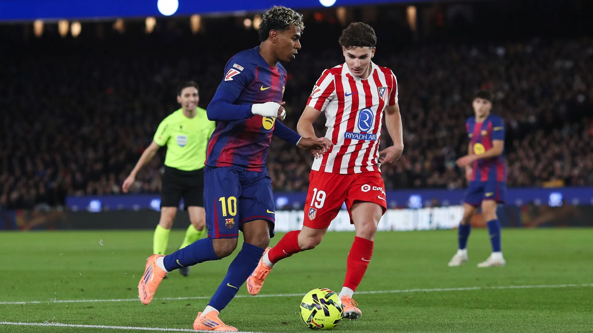 Barcelona's Lamine Yamal and Atletico Madrid's Julian Alvarez