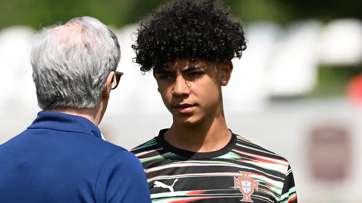 Cristiano Ronaldo Jr of Portugal speaks to a coach
