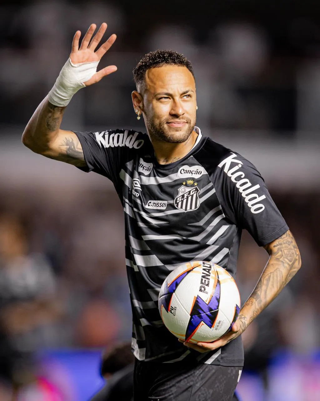 Neymar of Santos warming up prior to the game.