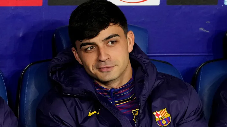Pedri of FC Barcelona looks on from the bench during the LaLiga EA Sports match.
