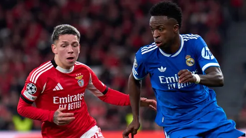 Vinicius Junior of Real Madrid is challenged by Gianluca Prestianni of SL Benfica.