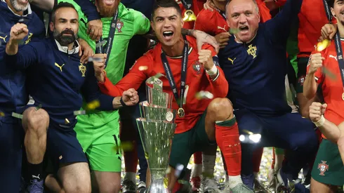 Cristiano Ronaldo and team mates of Portugal pose for a photo with the UEFA Nations League trophy