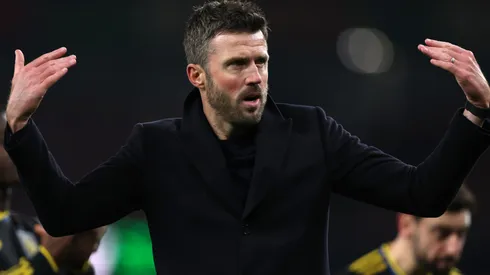 Michael Carrick, Head Coach of Manchester United, shows appreciation to the fans.