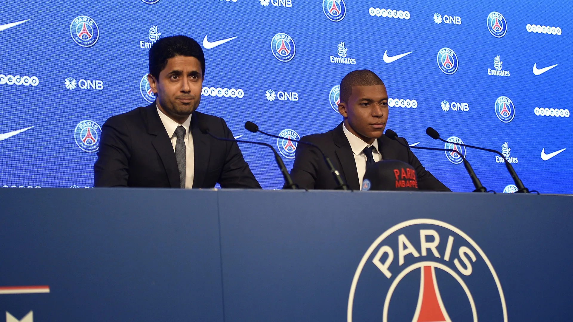 Paris Saint-Germain President Nasser Al Khelaifi presenting new signing Kylian Mbappe.