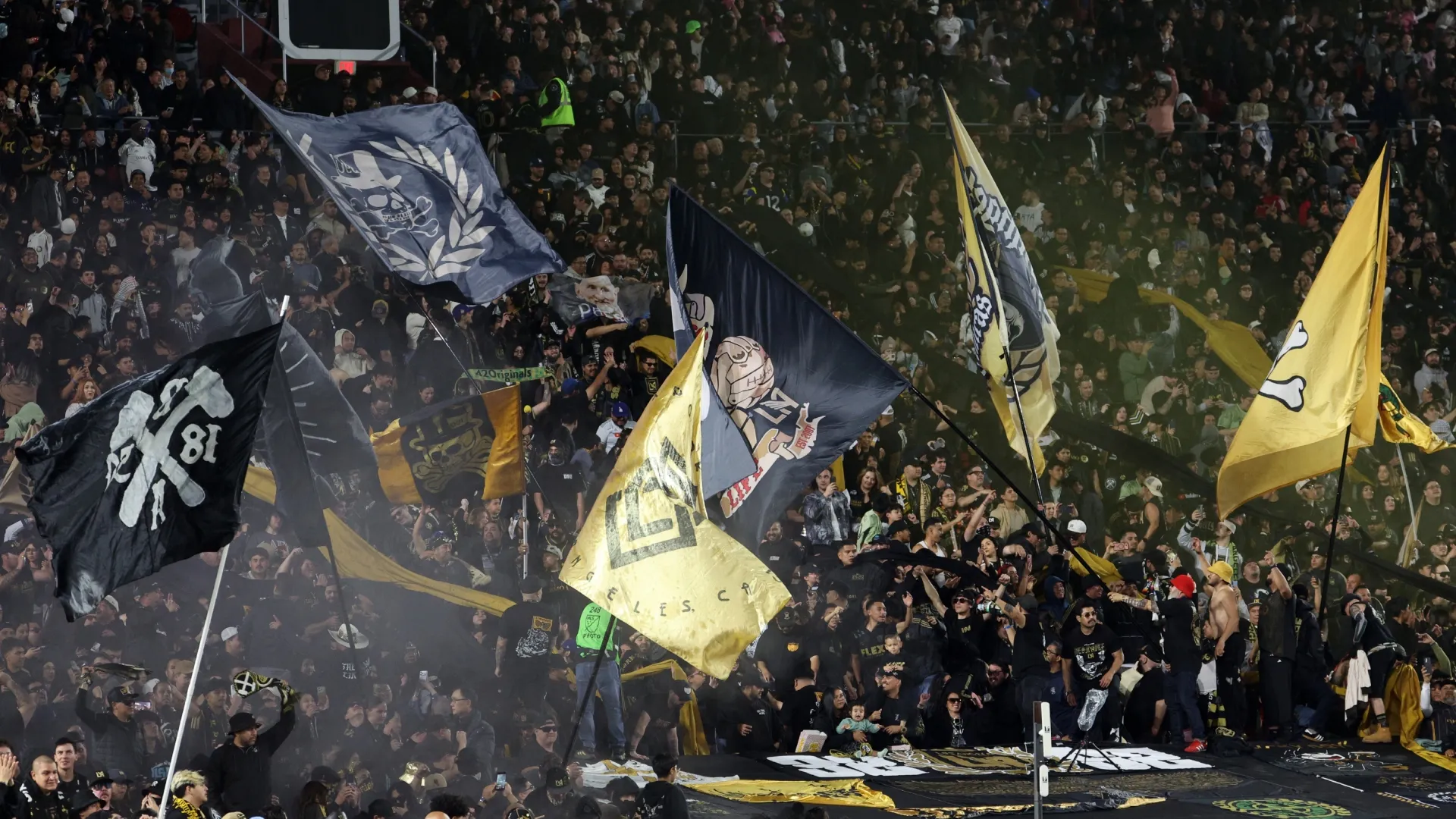 Fans of Los Angeles FC cheer during the MLS match against Inter Miami CF at Los Angeles Memorial Coliseum.