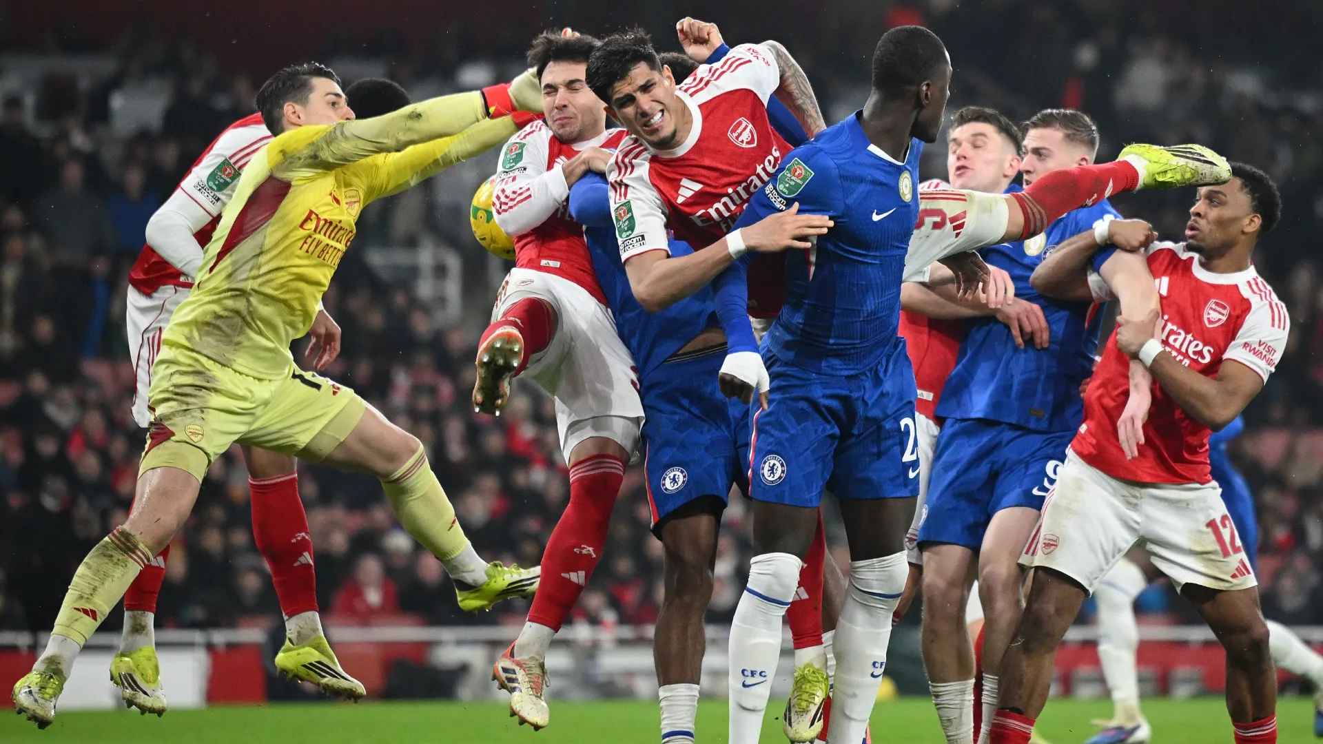 Kepa Arrizabalaga of Arsenal attempts to clear the ball during a goal mouth scramble.