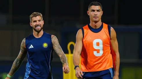 Inigo Martinez and Cristiano Ronaldo in training