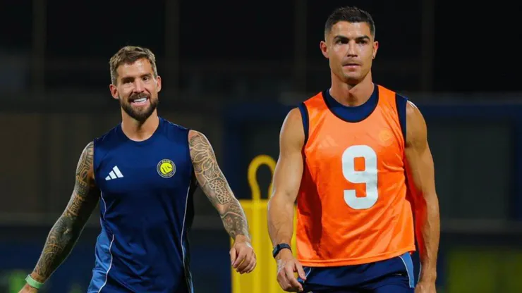 Inigo Martinez and Cristiano Ronaldo in training