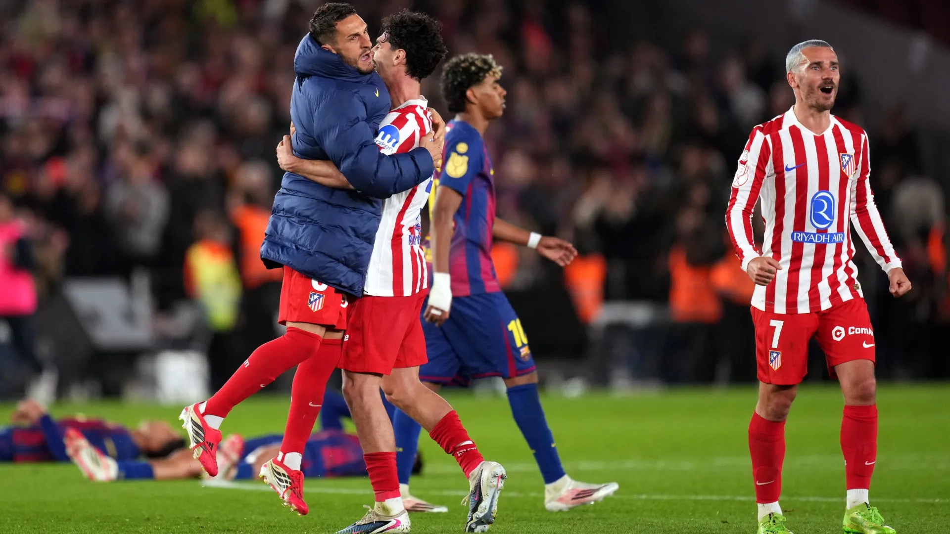 Koke, Johnny Cardoso and Antoine Griezmann of Atletico de Madrid celebrate victory.