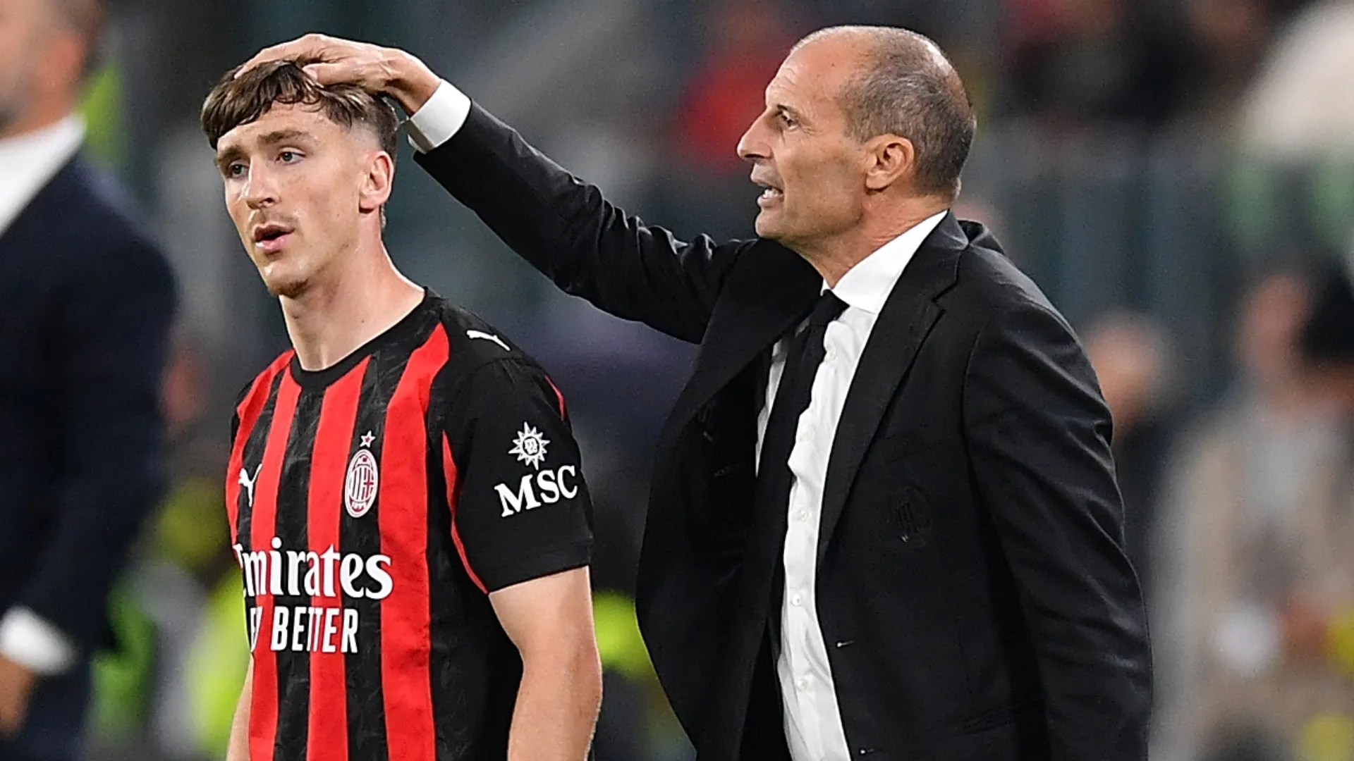 AC Milan's Alexis Saelemakers and Massimiliano Allegri