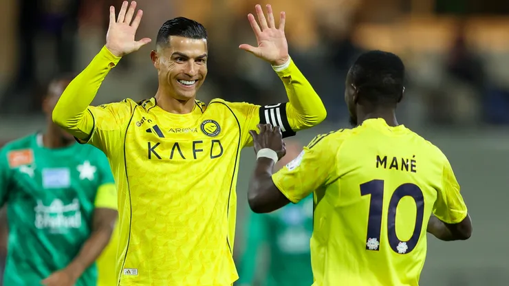 Sadio Mane of Al Nassr celebrates with teammate Cristiano Ronaldo
