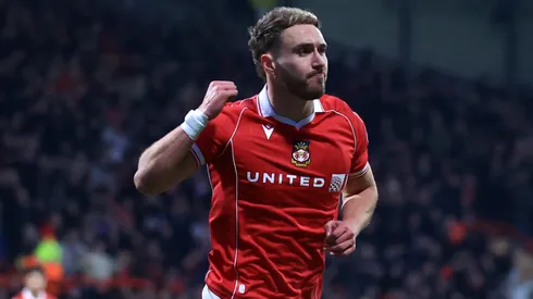 Sam Smith of Wrexham celebrates scoring against Chelsea
