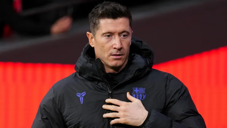 Robert Lewandowski of FC Barcelona walks over to the substitution bench.
