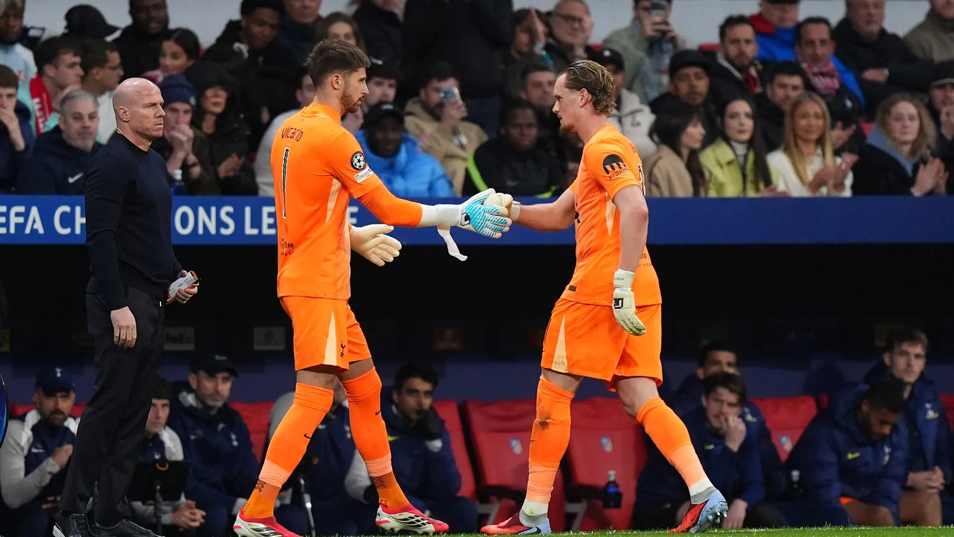 Antonin Kinsky of Tottenham Hotspur leaves the pitch after being substituted, and is replaced by Guglielmo Vicario.