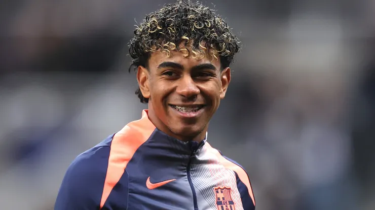 Lamine Yamal of FC Barcelona smiles during warm up.
