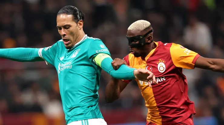 Virgil van Dijk of Liverpool is challenged by Victor Osimhen of Galatasaray
