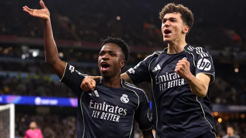 Vinicius Junior of Real Madrid celebrates scoring against Manchester City.
