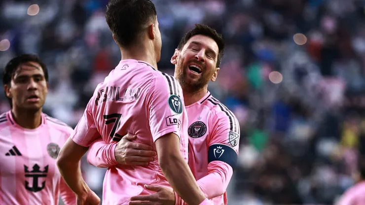 Lionel Messi #10 of Inter Miami CF celebrates with teammate Sergio Reguilon.
