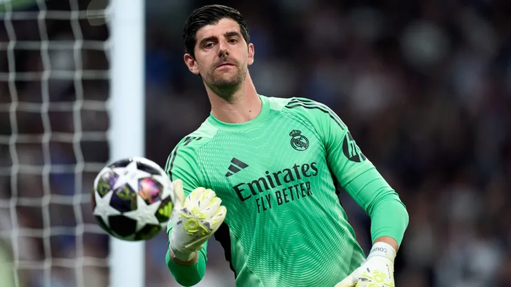 Thibaut Courtois of Real Madrid throws the ball during the UEFA Champions League.
