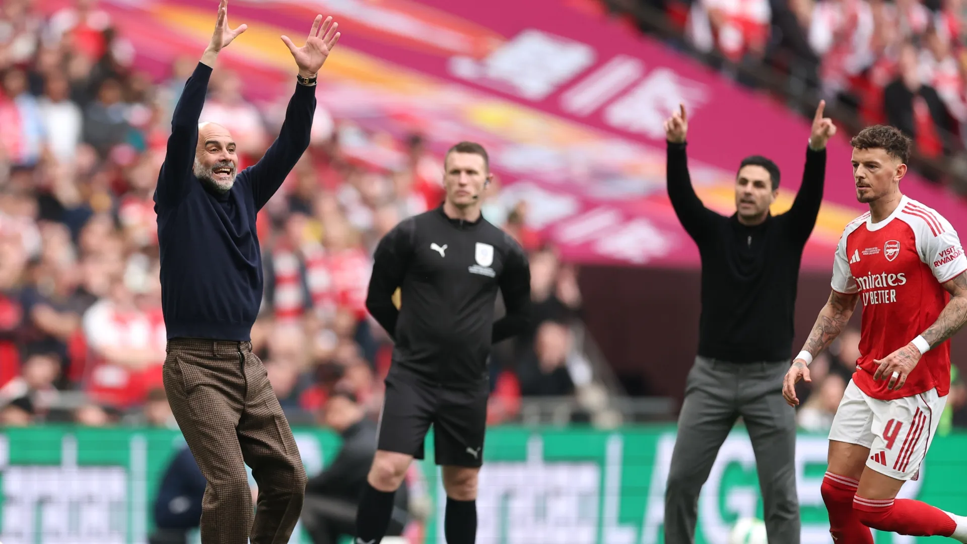 Pep Guardiola, Manager of Manchester City and Mikel Arteta of Arsenal during the Carabao Cup Final.