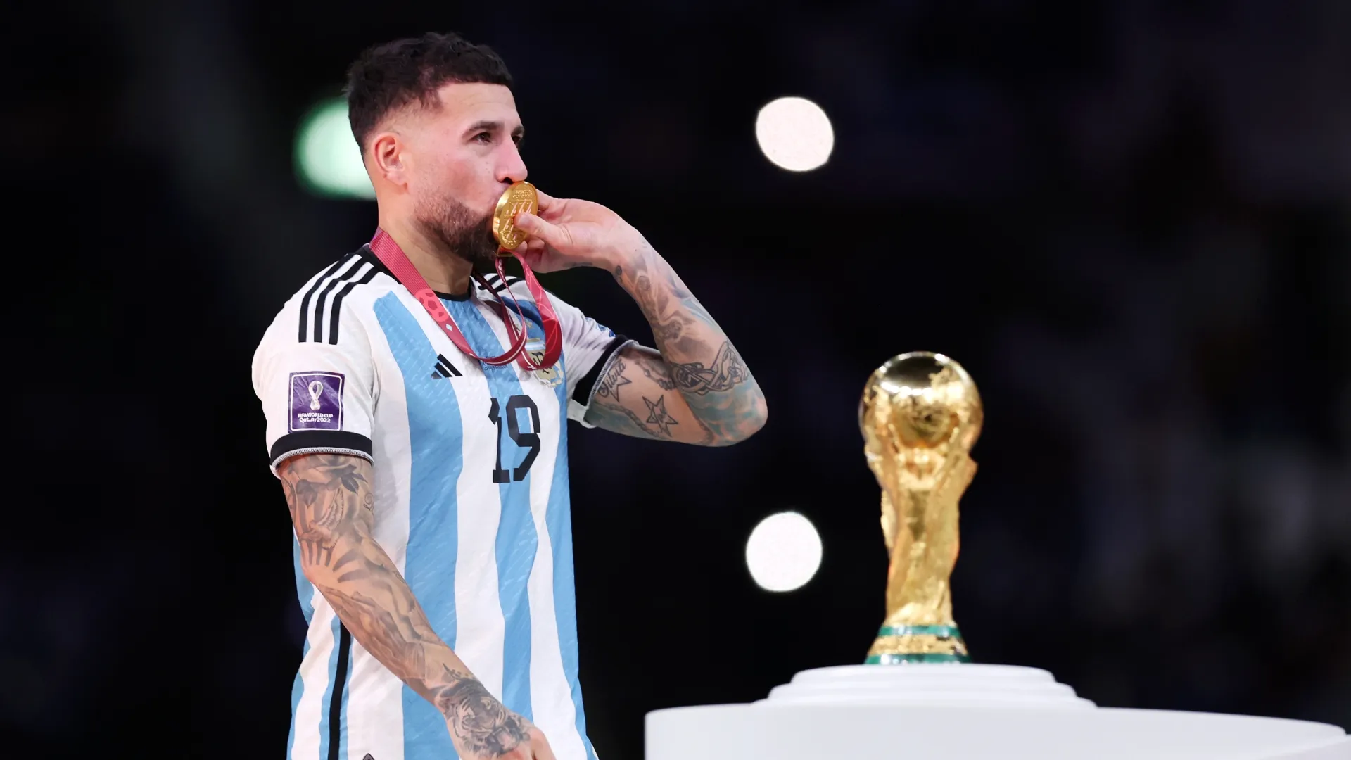 Nicolas Otamendi of Argentina kisses the FIFA World Cup Qatar 2022 Winners Medal.