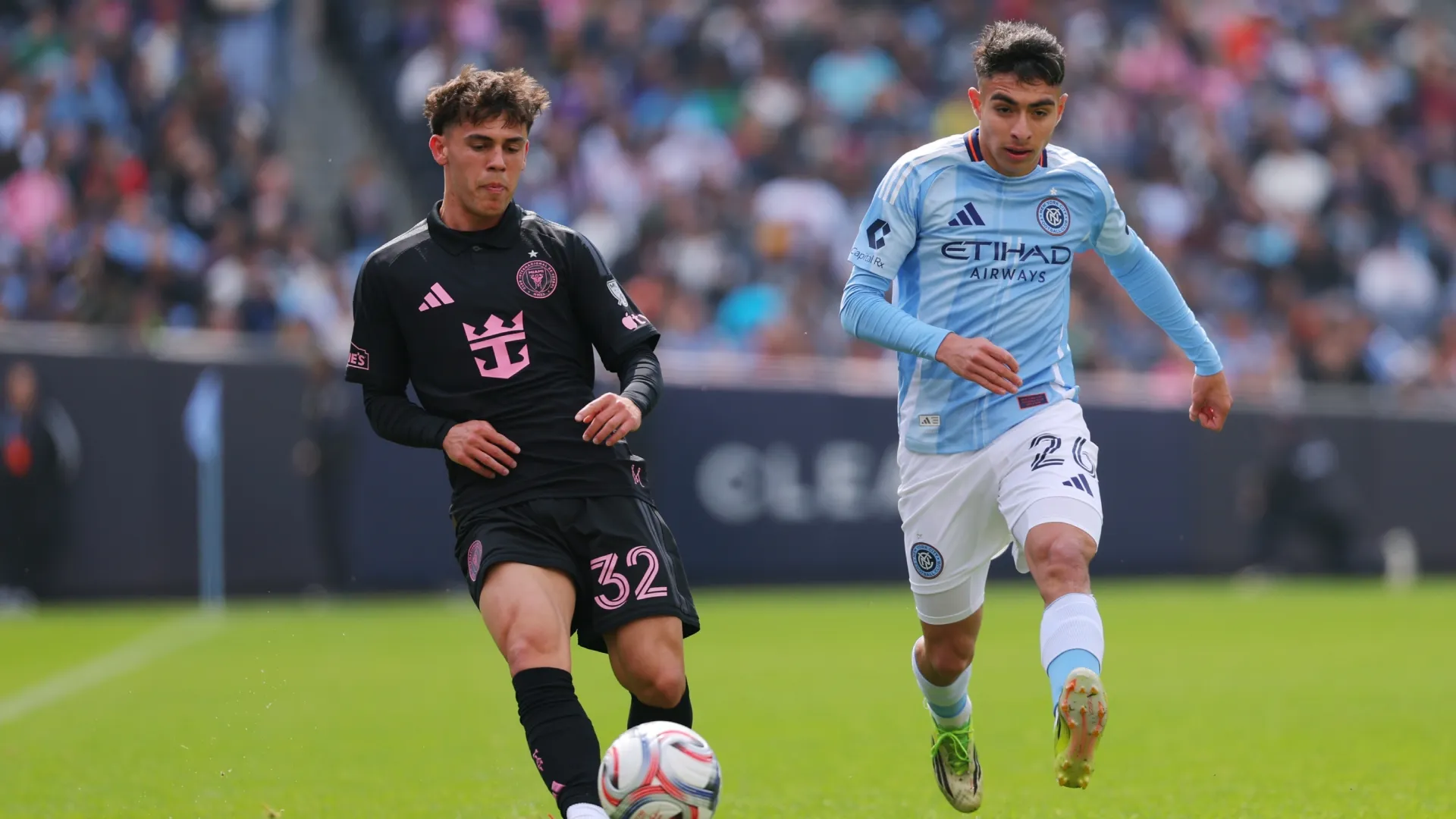 Noah Allen #32 of Inter Miami CF and Agustin Ojeda #26 of New York City FC compete for the ball.
