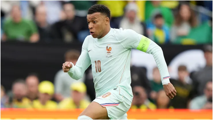 Kylian Mbappe of France runs with the ball during the international friendly match against Brazil.