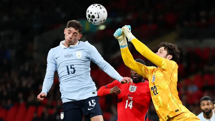 James Trafford of England makes a save from Federico Valverde of Uruguay.