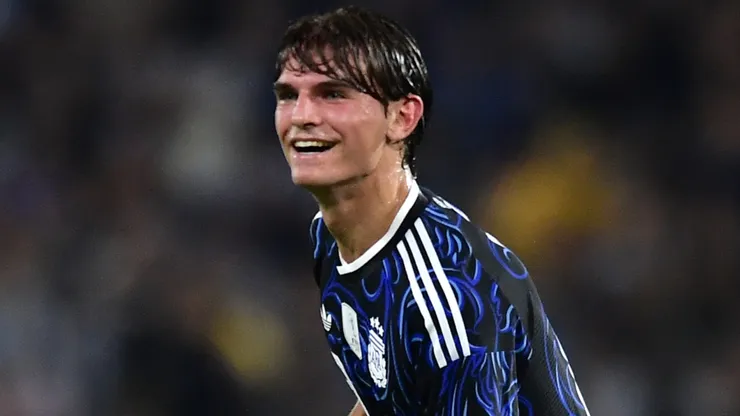 Nico Paz of Argentina celebrates scoring a goal.
