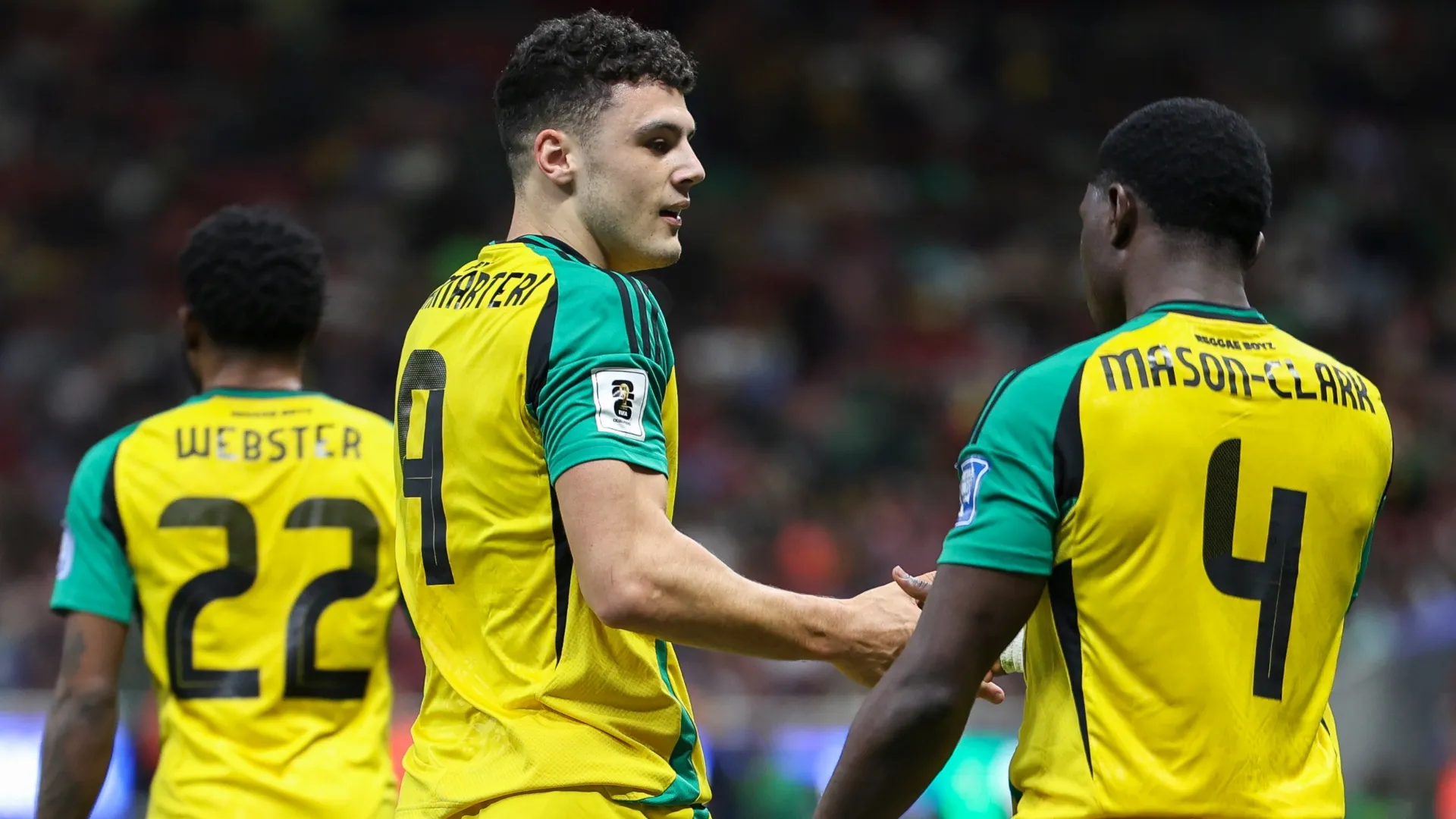 Bailey Cadamarteri of Jamaica celebrates the team's first goal with Ephron Mason-Clark.