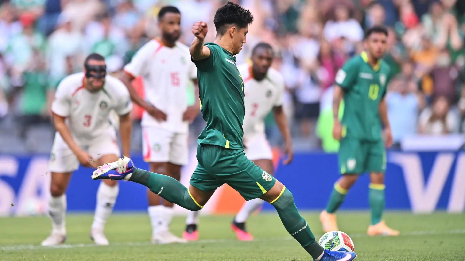 Miguel Terceros of Bolivia takes a penalty against Suriname.