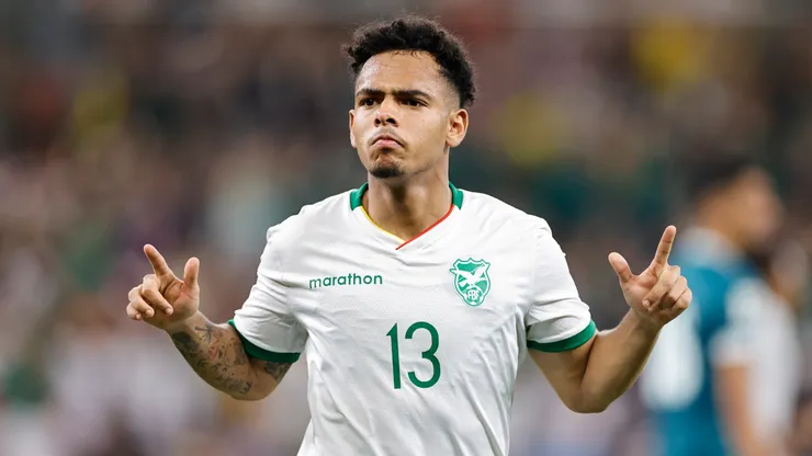Moises Paniagua of Bolivia celebrates after scoring against Iraq.