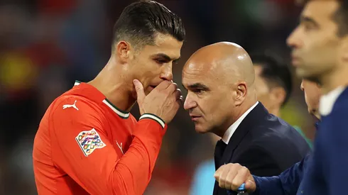 Cristiano Ronaldo of Portugal interacts with Roberto Martinez