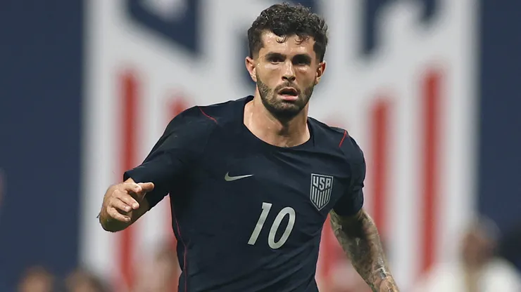 Christian Pulisic #10 of the United States dribbles