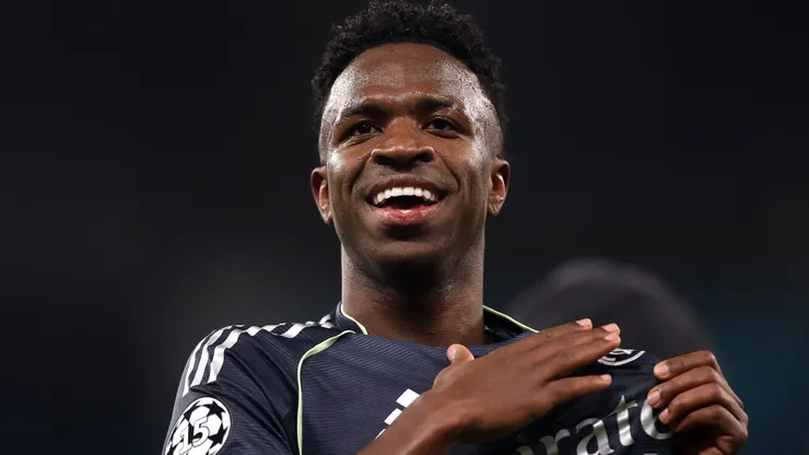 Vinicius Junior of Real Madrid celebrates victory following the UEFA Champions League.