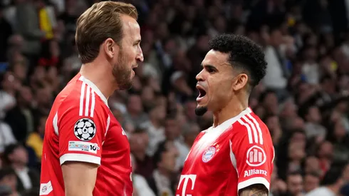 Harry Kane of FC Bayern Munich celebrates scoring his team's second goal with teammate Luis Diaz.