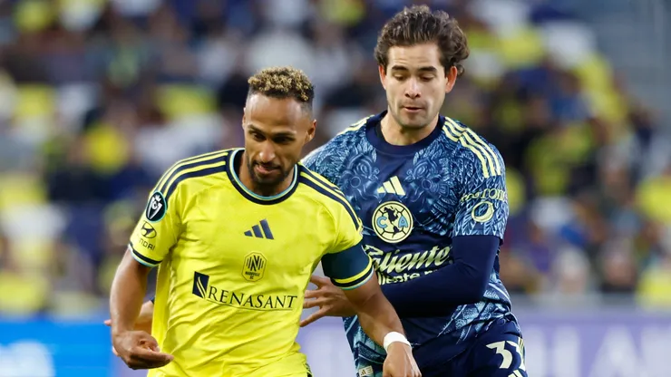 Hany Mukhtar of Nashville SC dribbles the ball against Patricio Salas of Club America