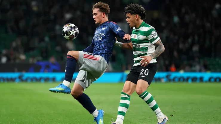 Max Dowman of Arsenal controls the ball while under pressure from Maximiliano Araujo of Sporting CP