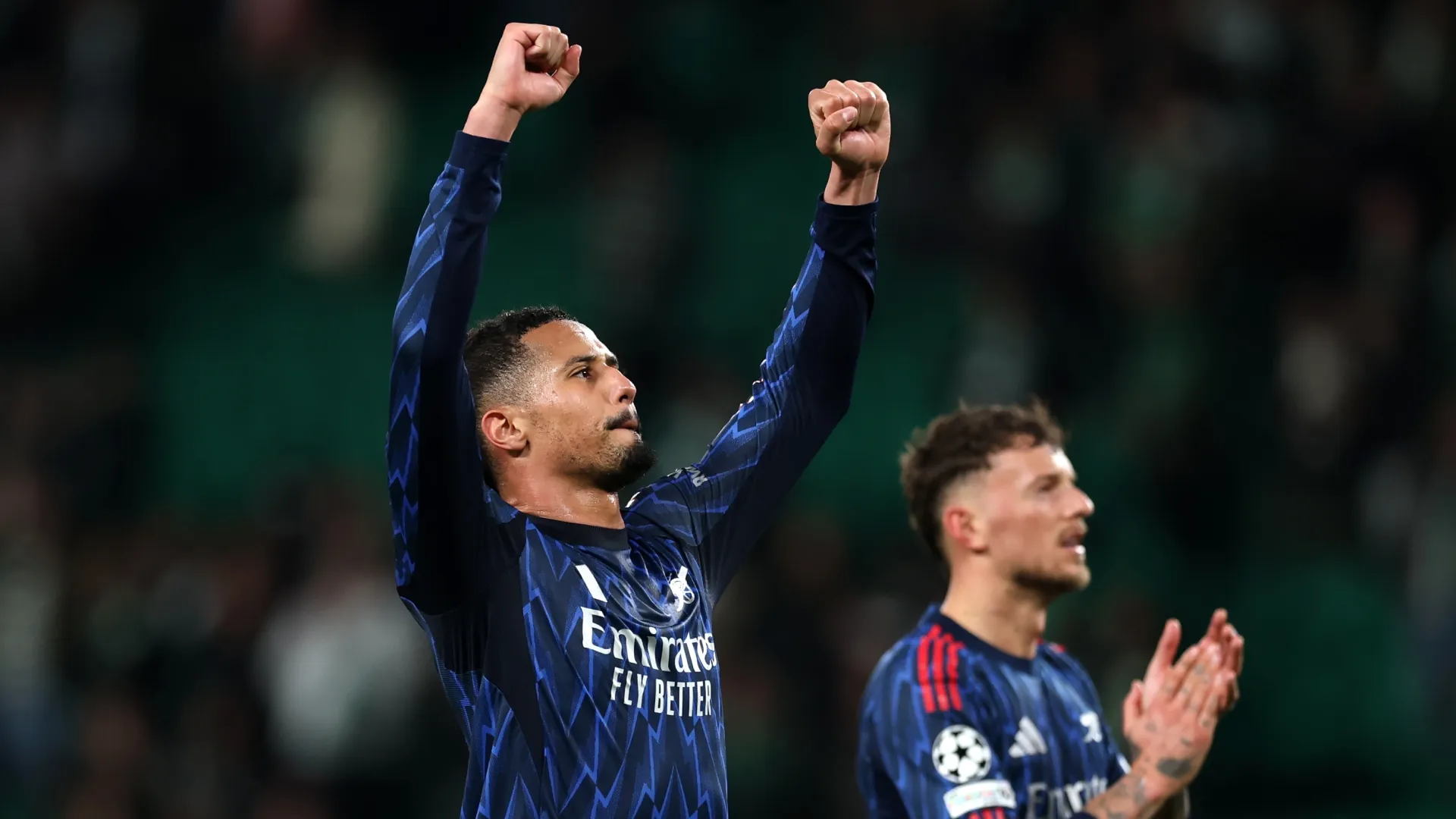 William Saliba of Arsenal celebrates after the team's victory over Sporting CP.