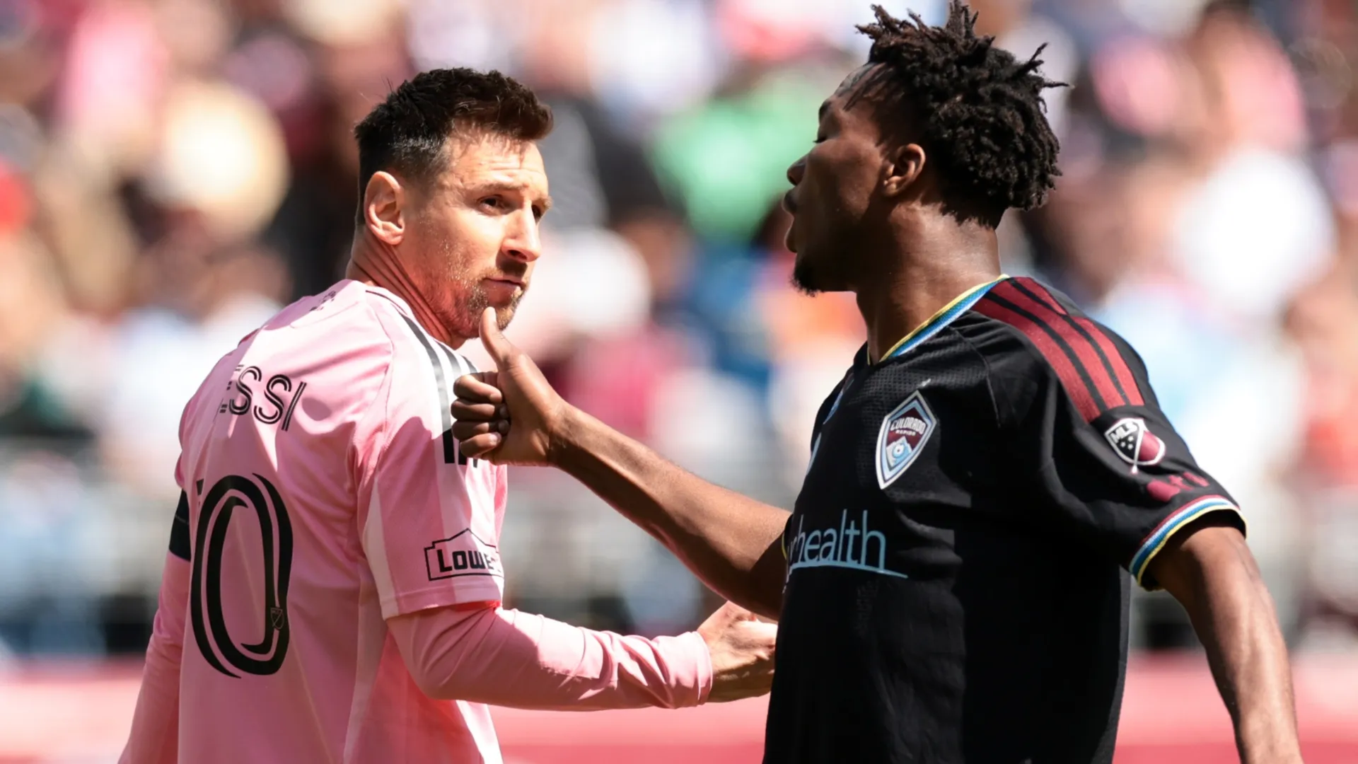 Lionel Messi #10 of Inter Miami CF reacts with Hamzat Ojediran #8 of Colorado Rapids.