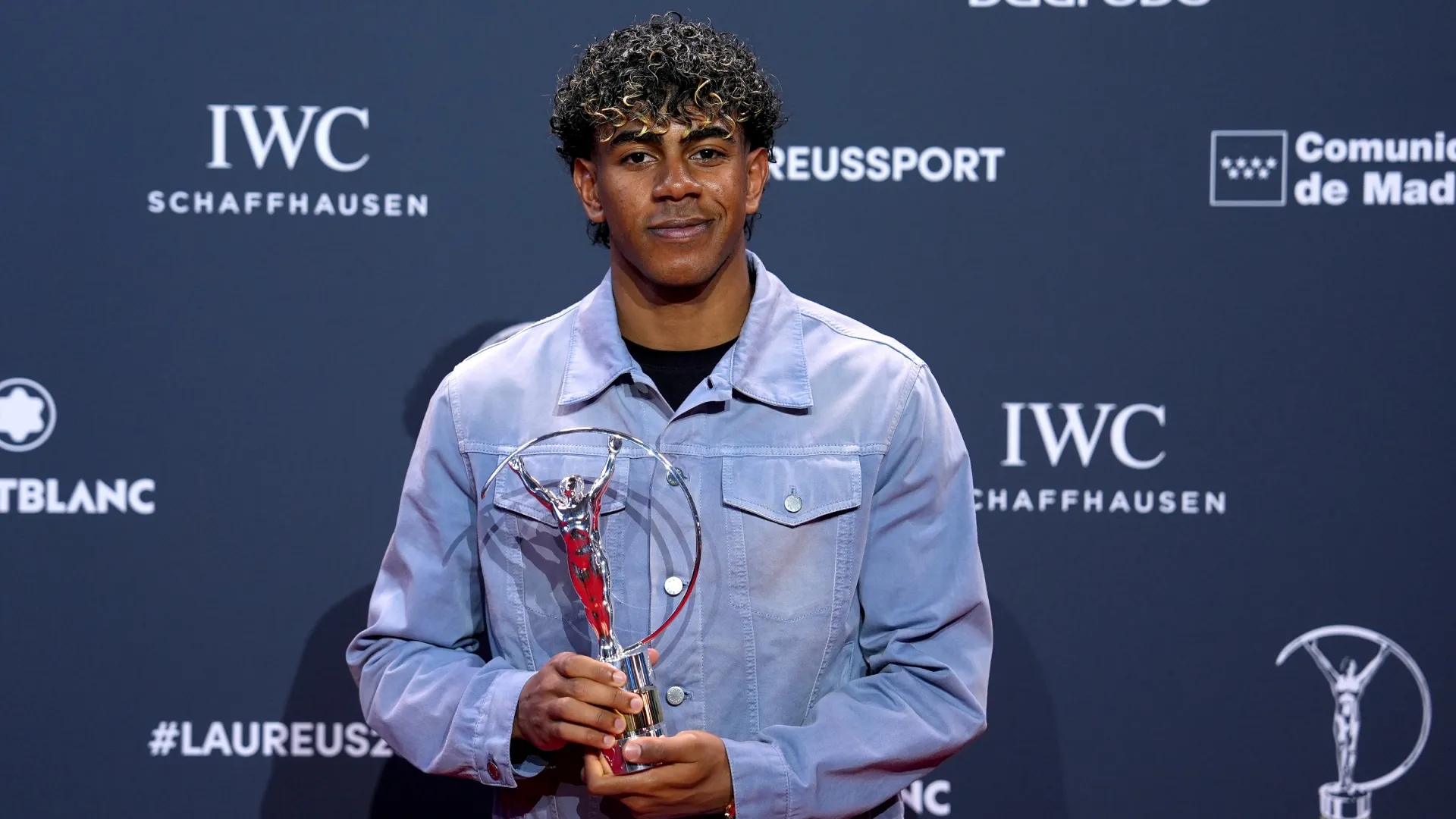 Barcelona Player, Lamine Yamal poses with the Laureus World Young Sportsperson of the Year Award.