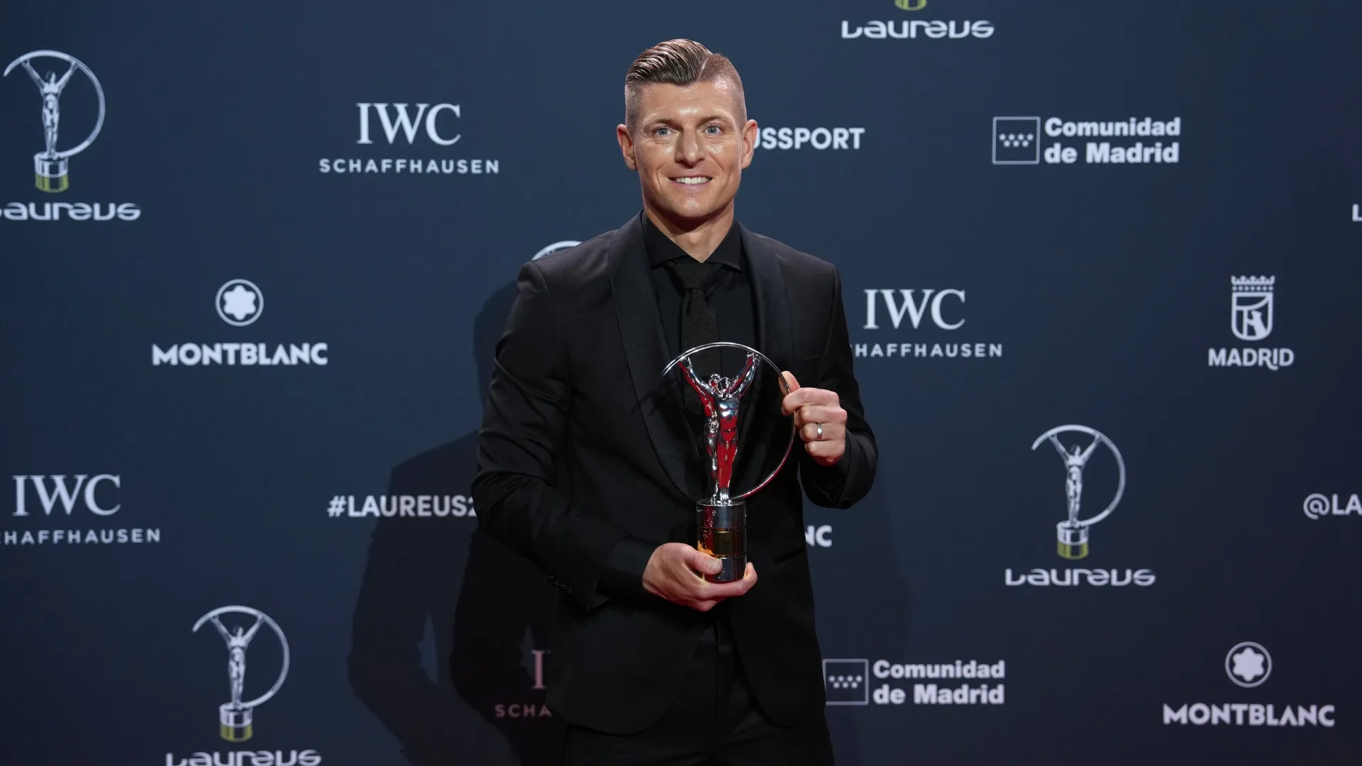 German Footballer Toni Kroos poses with the Laureus Sporting Inspiration award.