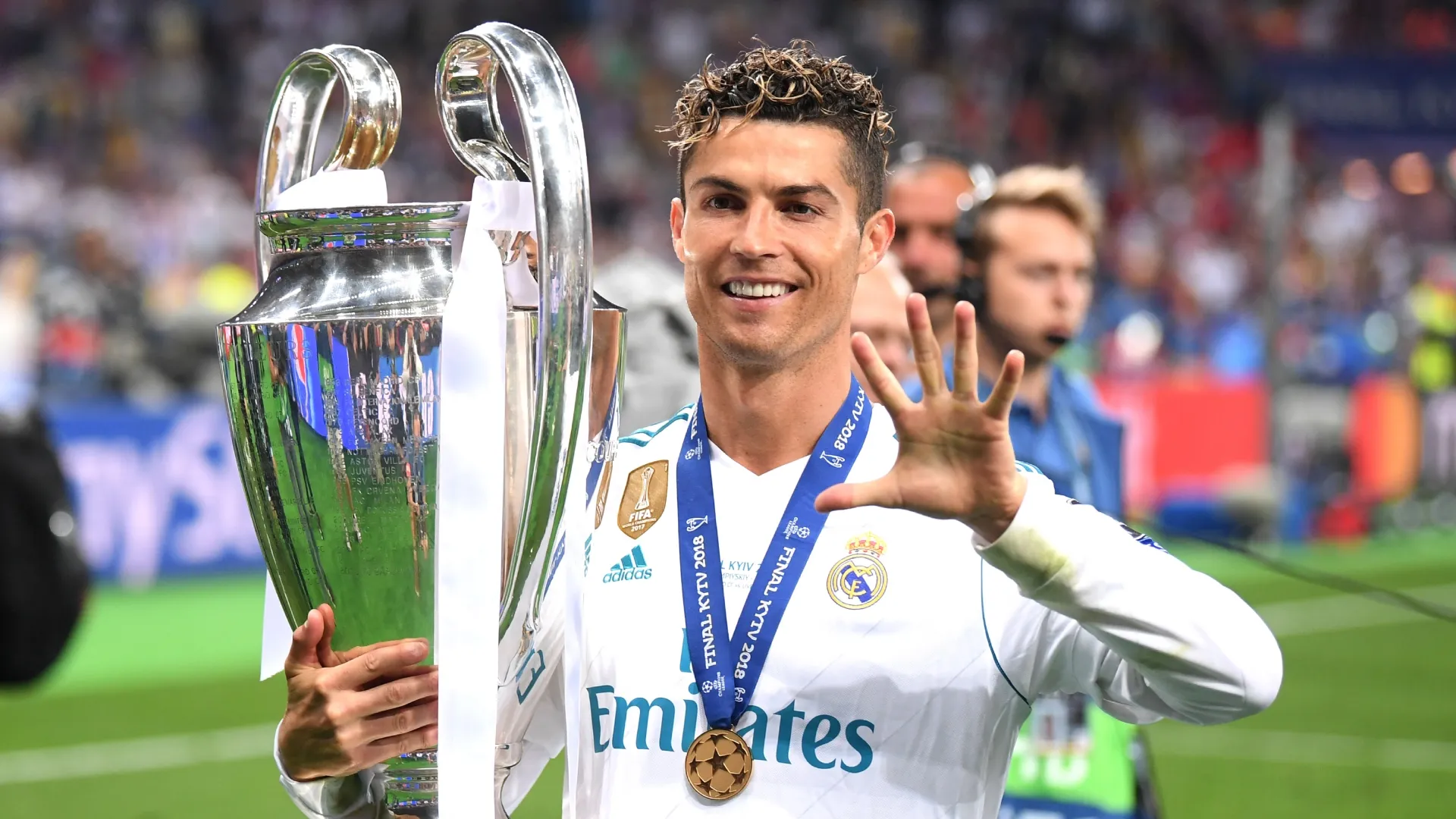 Cristiano Ronaldo of Real Madrid lifts the UEFA Champions League trophy.