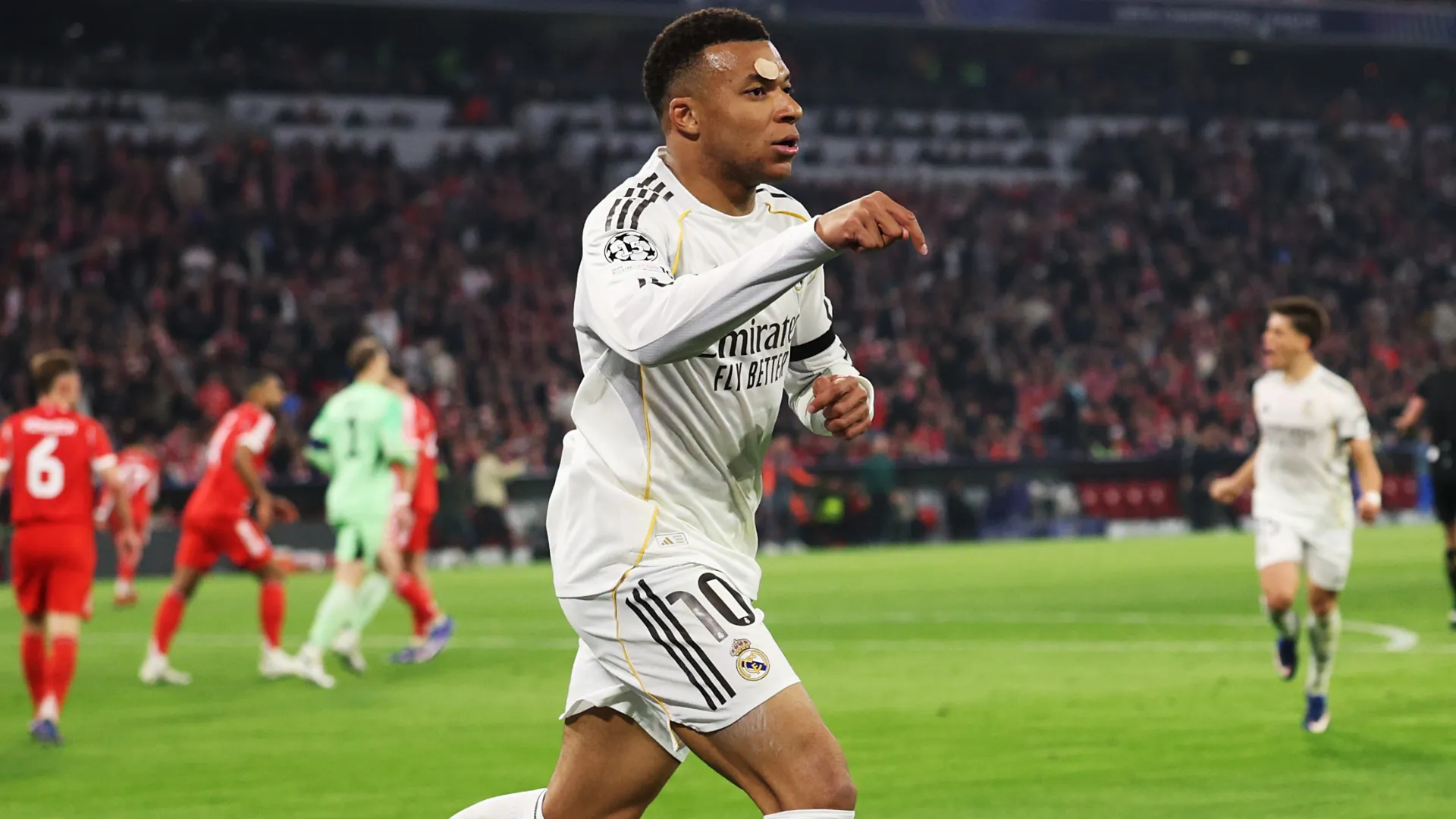 Kylian Mbappe of Real Madrid celebrates after scoring against Bayern Munich.